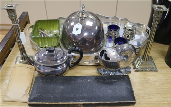 An Elkington & Co plated meat cover, a pair of Corinthian column candlesticks, a large oval tray and sundry plate